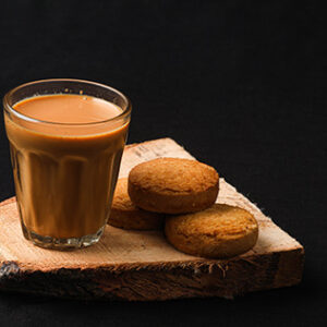 A TEA WITH BISCUIT IN PLATES